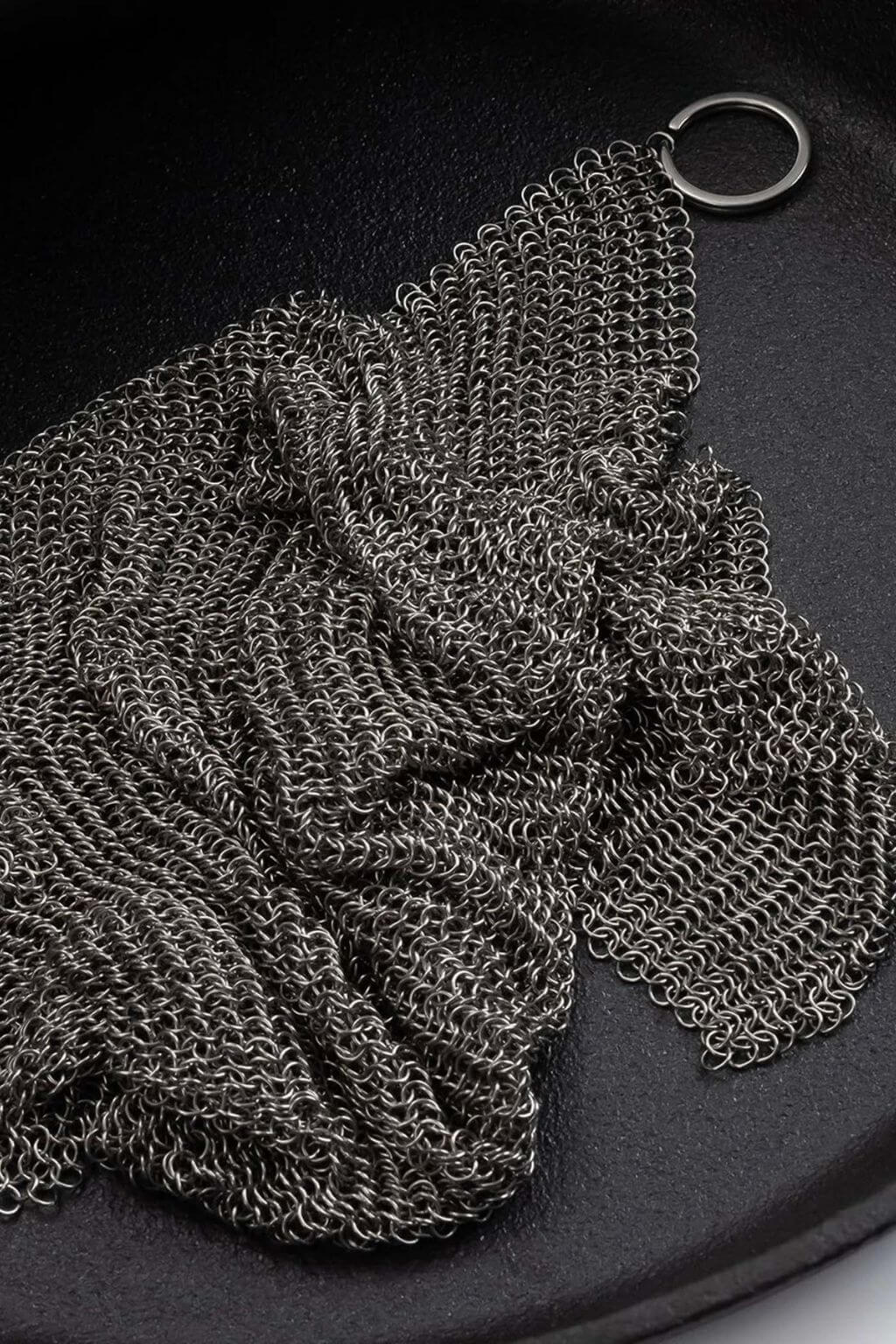 Close-up of chainmail scrubber for cast iron cleaning