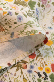 Close-up of Botanist Linen Tea Towel texture and Oana Befort illustrations.