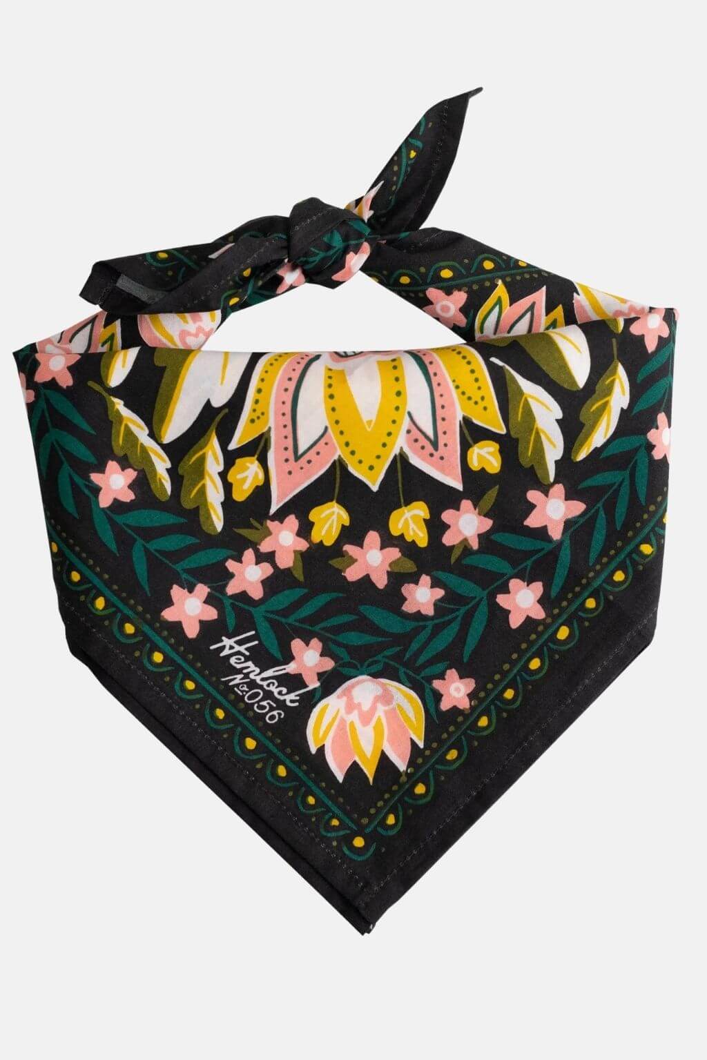 Betty Bandana folded and tied into a triangle with floral pattern displayed