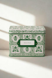 Artichoke Heirloom Recipe Tin in soft morning light with green and white floral motif