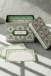 Rifle Paper Co. Artichoke Heirloom Recipe Tin open with matching recipe cards and dividers displayed