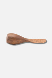 Single acacia canapé knife shown in profile on white background.