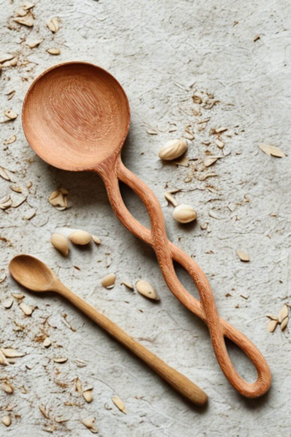 Twisted Handle Doussie Wood Spoon hand-carved from warm brown wood.