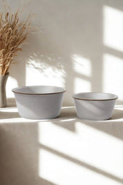 Large and small enamel mixing bowls in soft eggshell finish