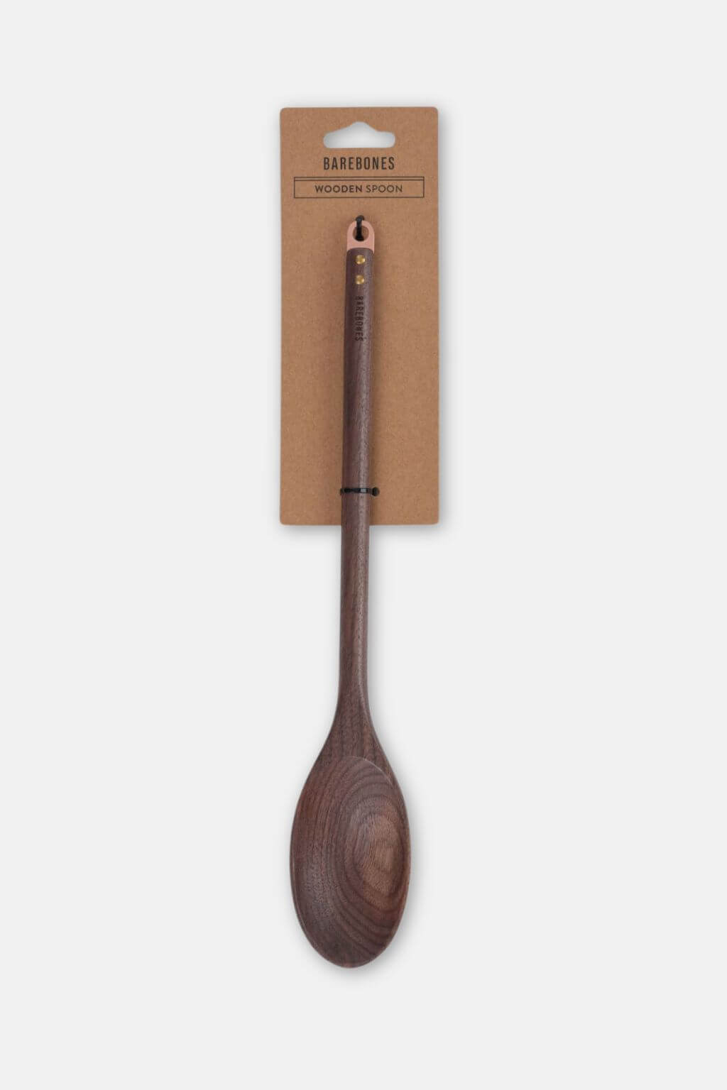 Black walnut wooden spoon on packaging