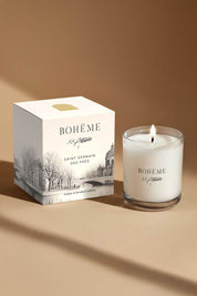 Bohème Saint-Germain-des-Prés candle and box styled together in warm light, evoking Parisian evenings