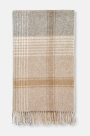 Folded British lambswool throw showing classic check pattern in beige, stone, and grey