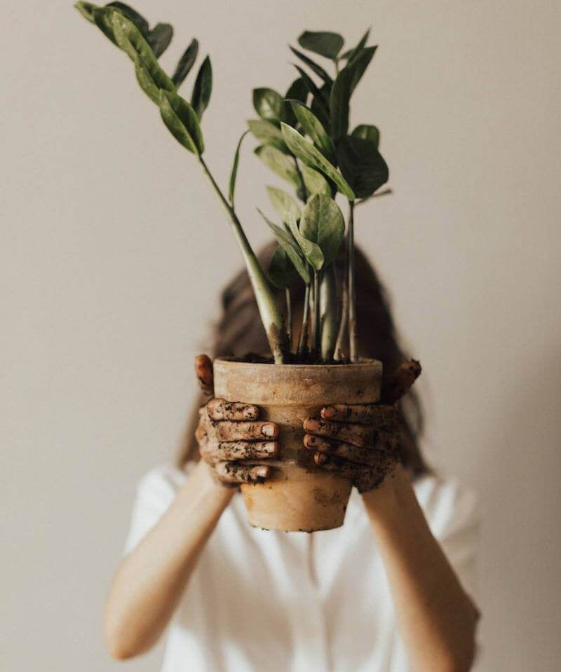 Cultiverre Gifts for Nature Lovers Collection | Woman holding potted plant