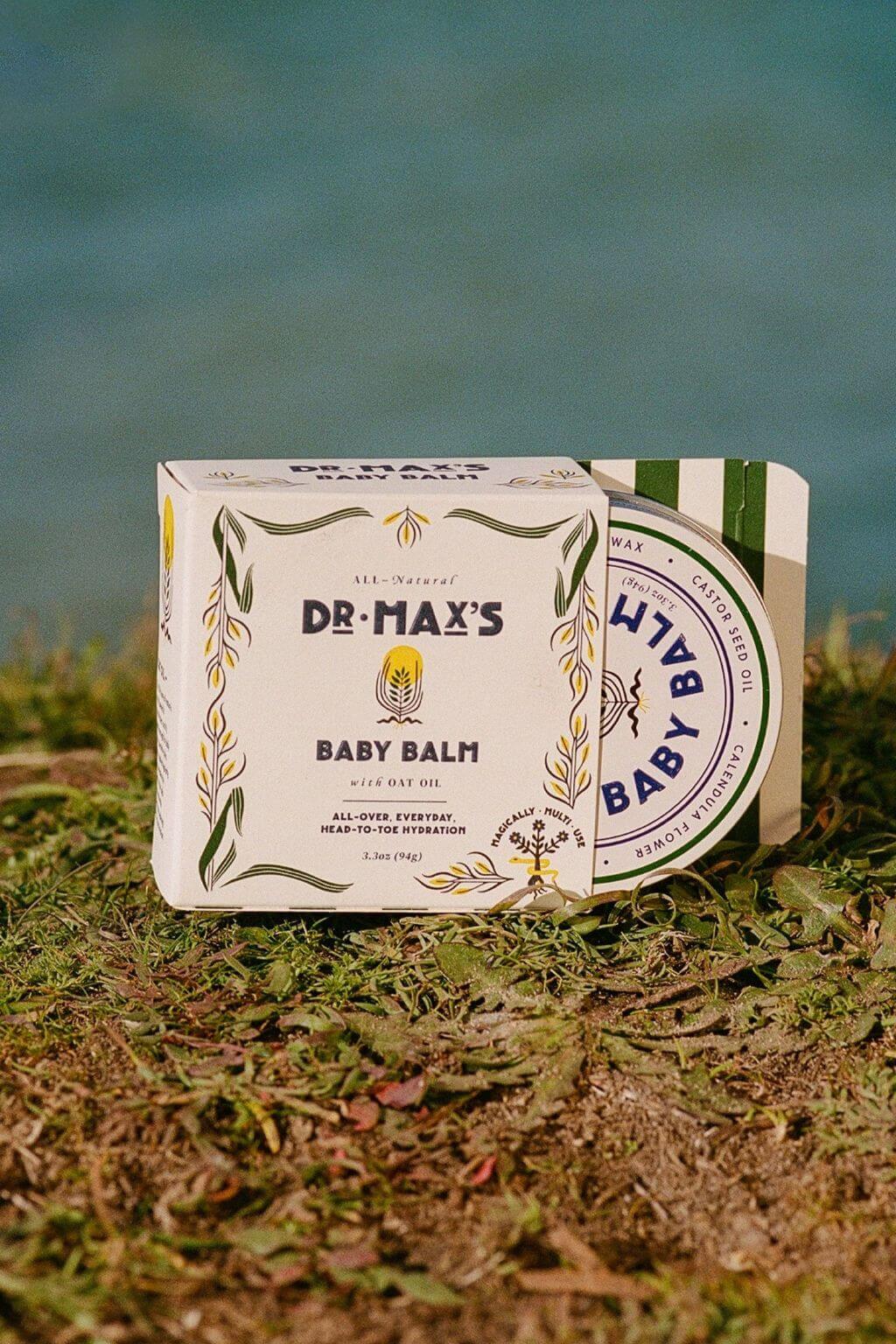 Boxed Dr. Max’s Baby Balm outdoors on grass