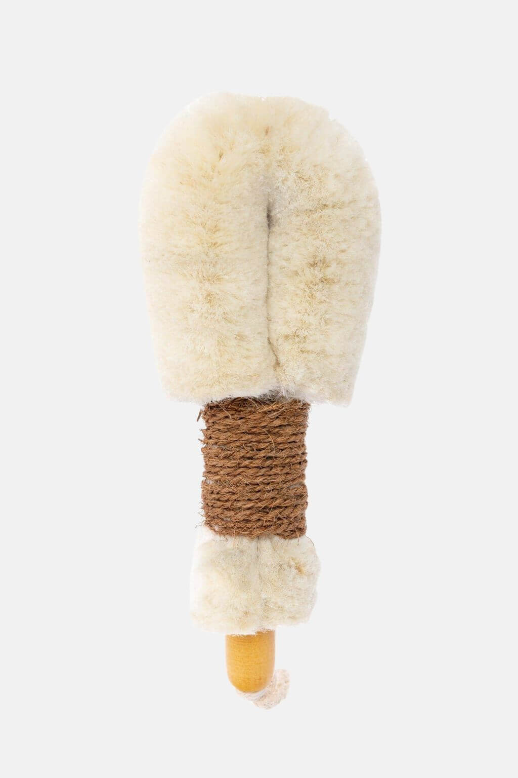 Close-up of plush jute bristles on dry brush