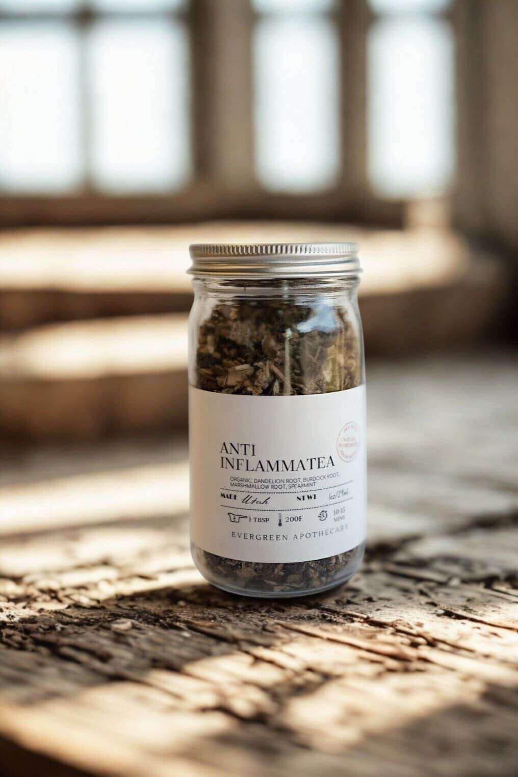 Anti-Inflammatea jar photographed on rustic wooden table in warm natural light