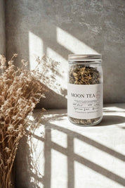 Moon Tea jar from Evergreen Apothecary styled with dried florals and warm natural light