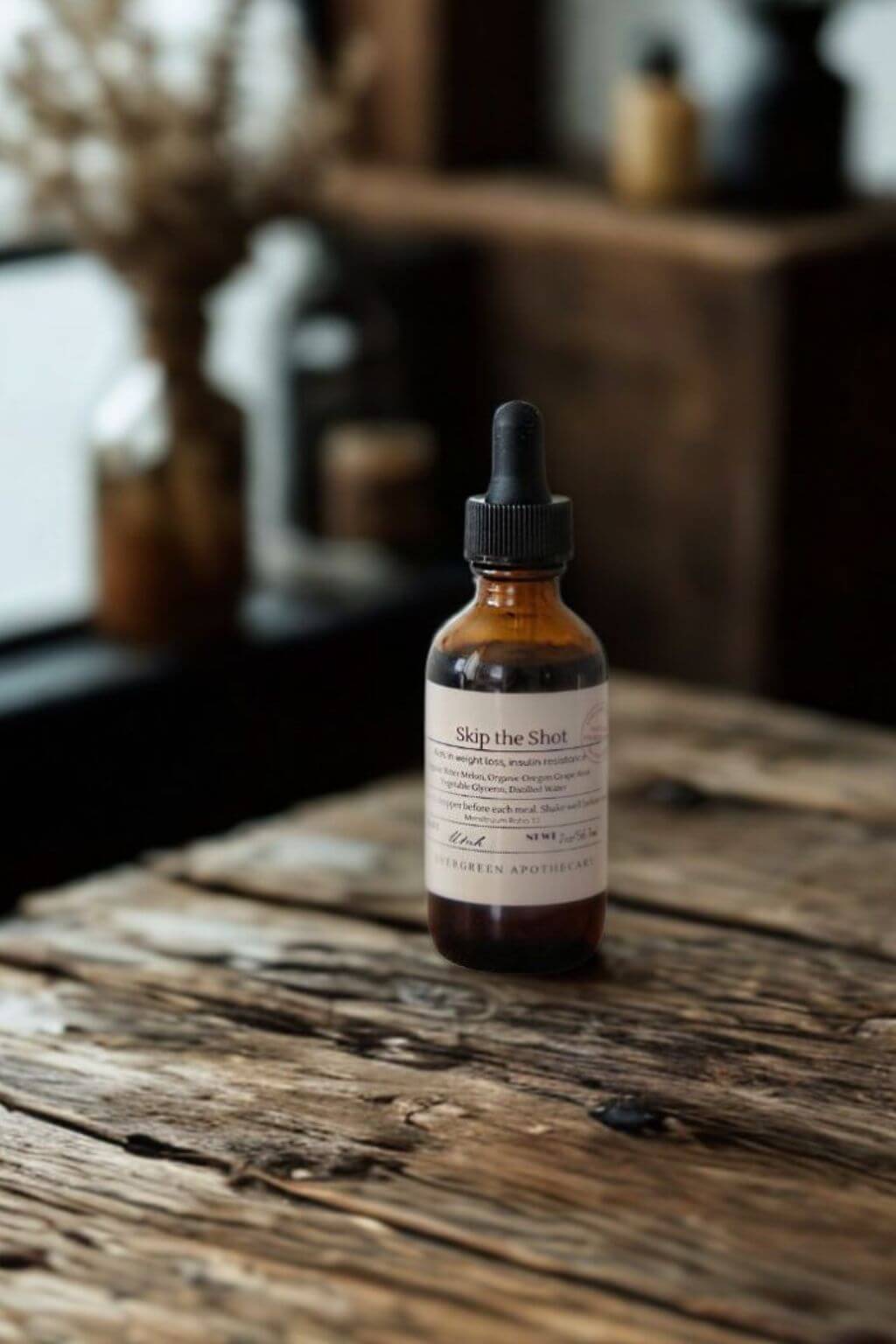 Skip the Shot tincture bottle on rustic wooden surface in moody natural light