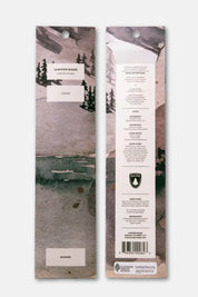 Product packaging with scenic design and Juniper Rose branding