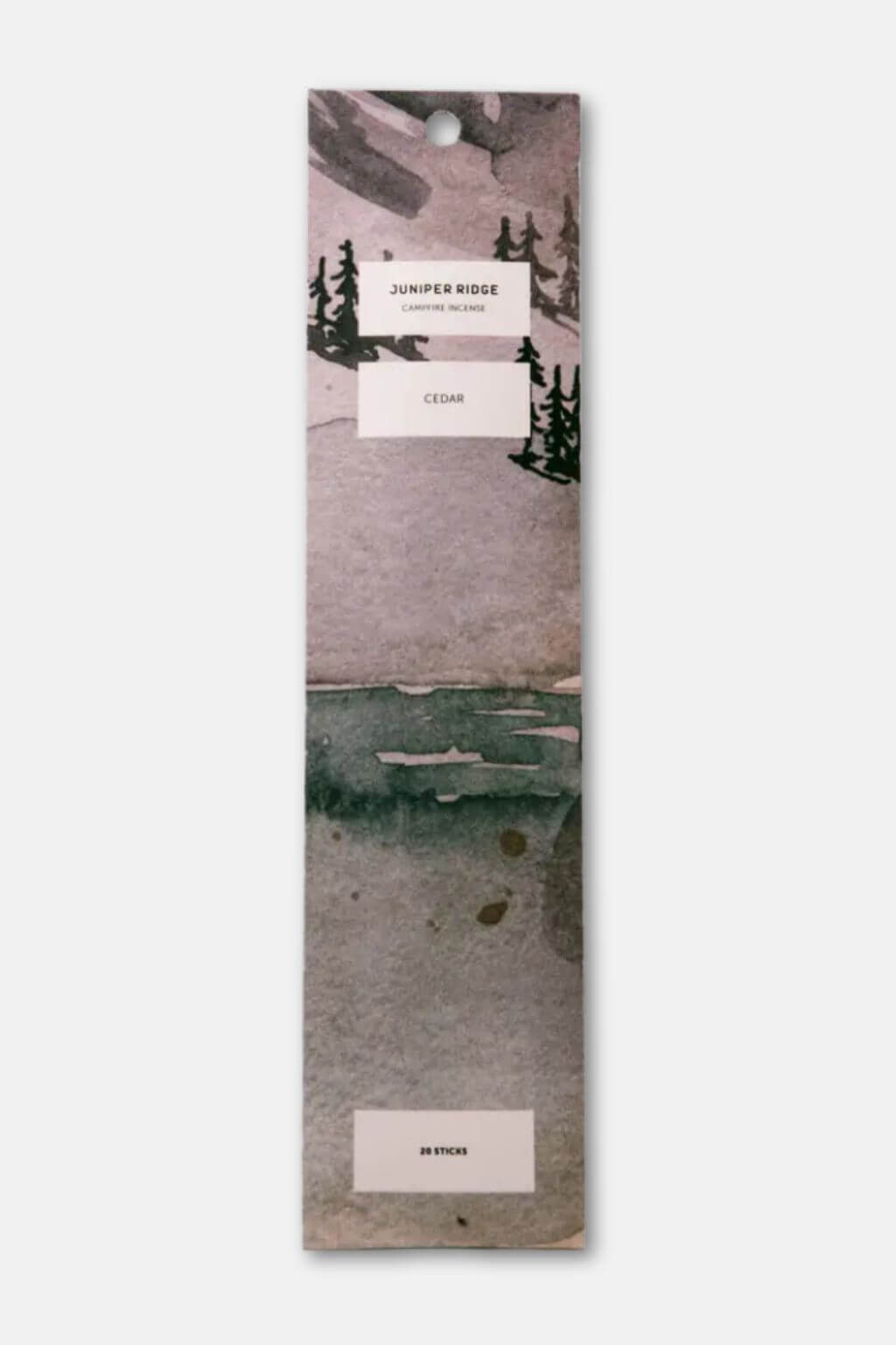 Juniper Ridge Cedar Incense packaging with nature-themed design on a white background