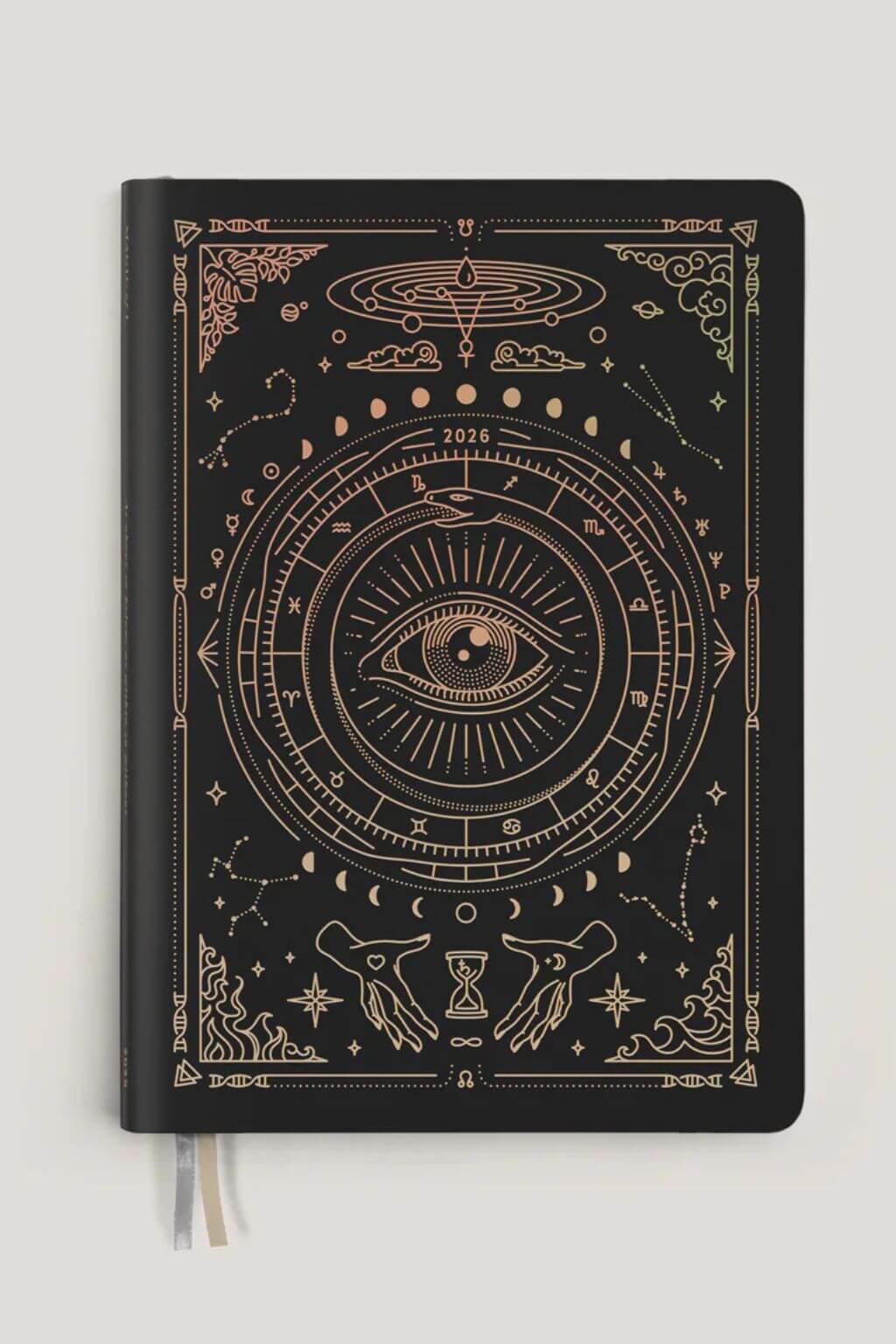 Magic of I 2026 Black Astrological Planner front cover with gold foil cosmic eye