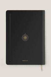 Magic of I 2026 Astrological Planner Black edition front cover with gold foil celestial eye