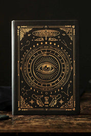 Magic of I 2026 Astrological Planner in Black with gold celestial and zodiac cover design
