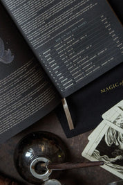 Interior pages showing astrology reference charts and cosmic layouts