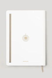 Minimal white back cover of Magic of I 2026 planner with gold detailing