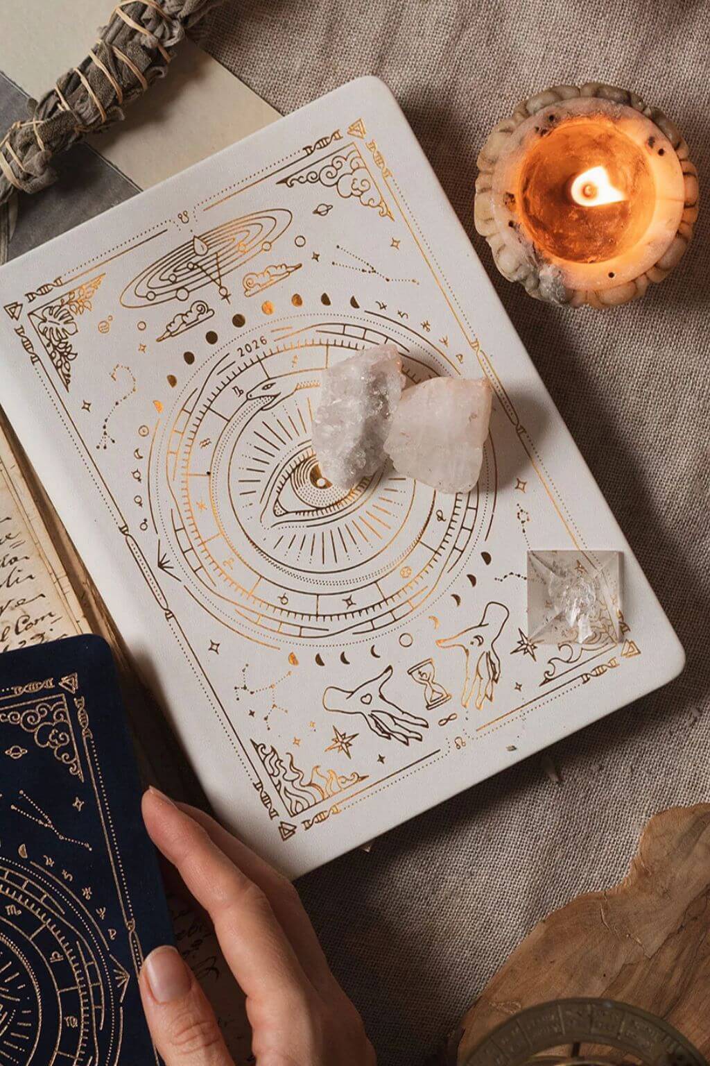 White Magic of I planner styled with crystals, books, and soft neutral textures