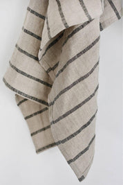 Close-up of black striped natural linen towel texture