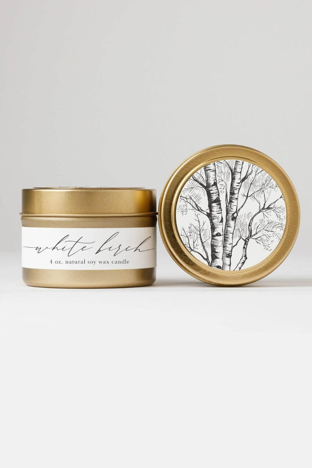 White Birch Travel Tin Candle with illustrated birch tree lid design