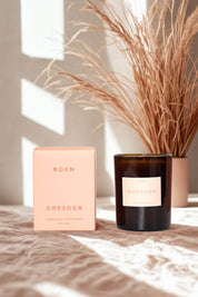 ROEN Dresden candle with box in soft sunlight on fabric