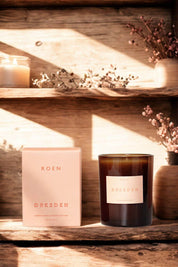 ROEN Dresden candle styled on wooden shelf with warm light