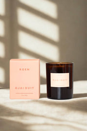 ROEN Ojai Nuit candle with packaging in bright natural light