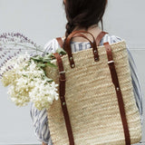 Gathering Wildflowers Straw Backpack with Brown Leather Straps